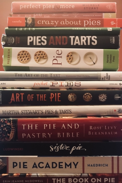 Stack of books on baking pies