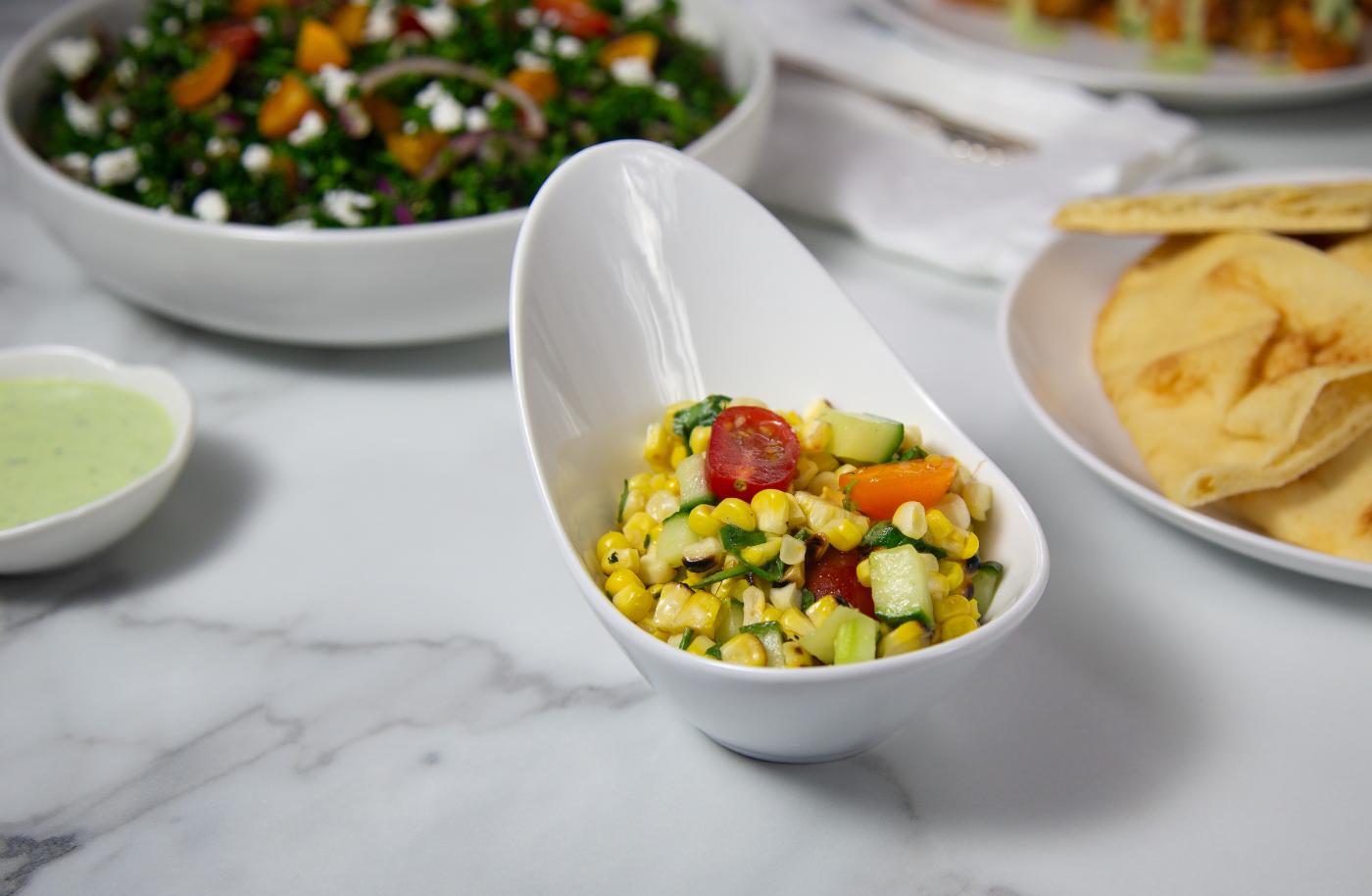 Grilled Corn and Tomato Salad with Hot Honey and Lime Dressing