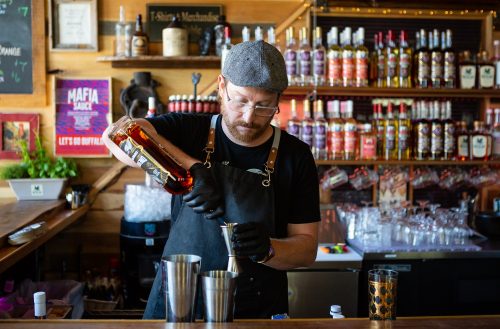 Dale Wright at Buffalo Distilling Company prepares a signature cocktail with Empire Rye Whiskey